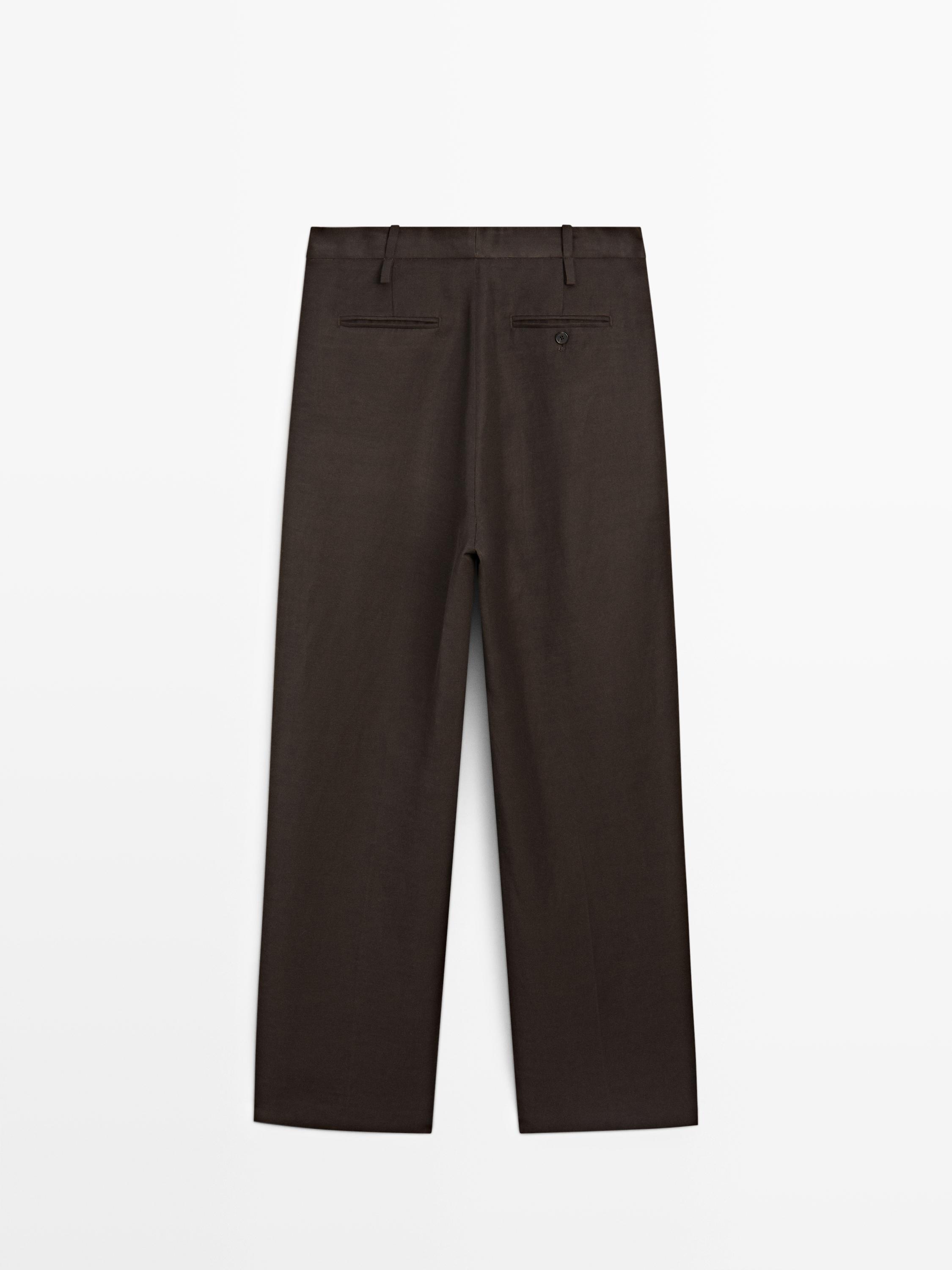 Pantalon à pinces avec passants - STUDIO